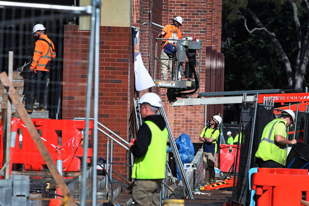 Construction workers are seen onsite at a combined residential and commercial development in Surry Hills of Sydney, Australia on June 24, 2024. (Lisa Maree Williams/Getty Images)