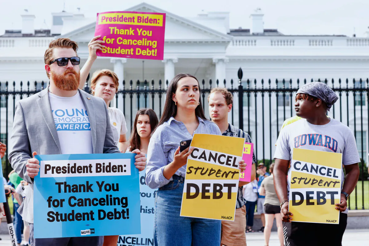 Activists hold a rally in front of the White House to celebrate the federal government’s intent to cancel student debt, which was later blocked by the Supreme Court, on Aug. 24, 2022. (Paul Morigi/Getty Images)
