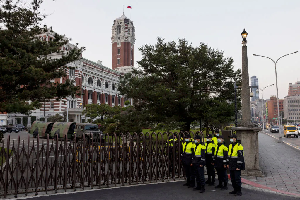 Military police wait to change guards by an entrance to the Presidential Palace in Taipei on Jan. 10, 2024. (ALASTAIR PIKE/AFP via Getty Images)
