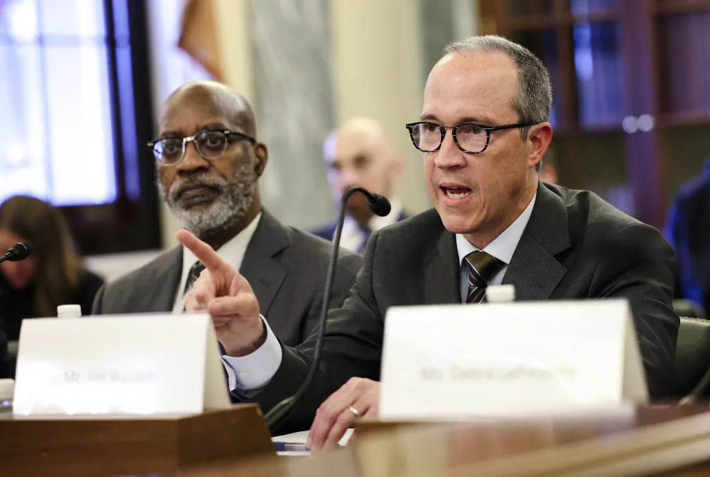 Jim Walden (R), partner at Walden, Macht & Haran, testifies alongside Edwin Moses, emeritus chair of the U.S. Anti-Doping Agency, during an event on Olympic doping held by the The Commission on Security and Cooperation in Europe (CSCE), in Washington, on July 21, 2021. (Kevin Dietsch/Getty Images)