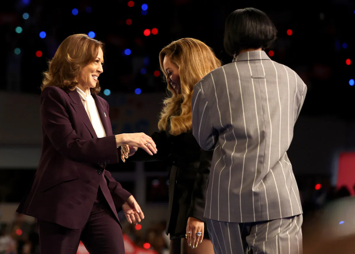 Vice President Kamala Harris (L), the Democratic presidential candidate, greets singer Beyoncé (R) during a campaign rally at Shell Energy Stadium in Houston on Oct. 25, 2024. (Justin Sullivan/Getty Images)