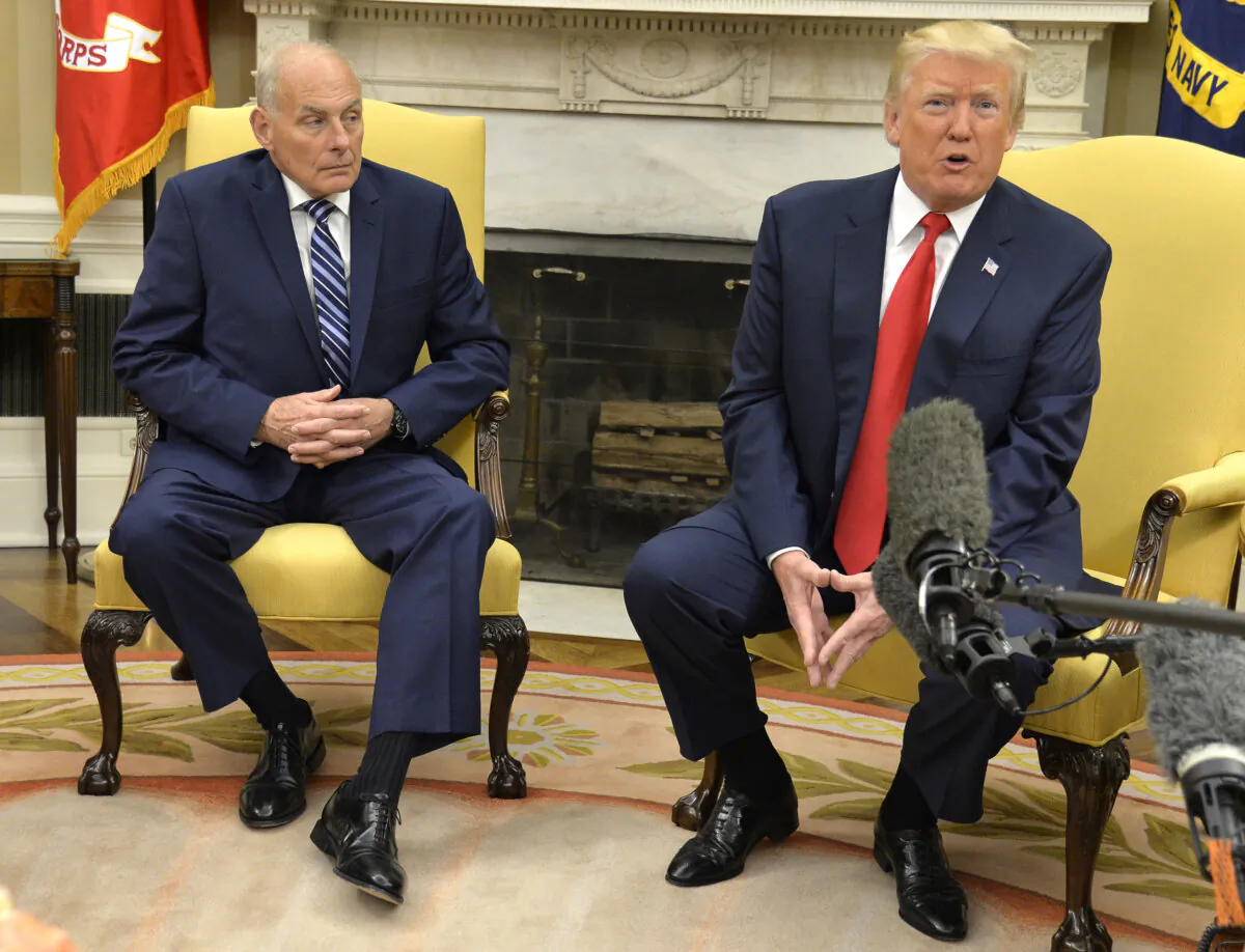 President Donald Trump (R) makes remarks to the press after the new White House Chief of Staff John Kelly was sworn in, in the Oval Office of the White House on July 31, 2017. (Mike Theiler-Pool/Getty Images)