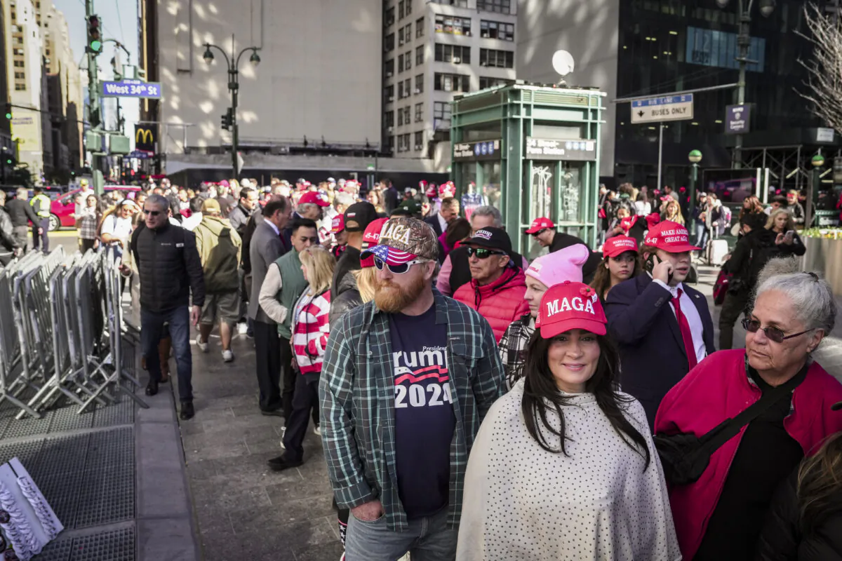 People wait in line to enter a rally with former president Donald J. Trump in Madison Square Garden in New York City on Oct. 27, 2024. (Samira Bouaou/The Epoch Times)