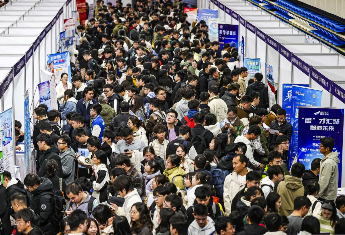 People attend a job fair in Shenyang, Liaoning Province, China, on Oct. 22, 2024. (STR/AFP via Getty Images)