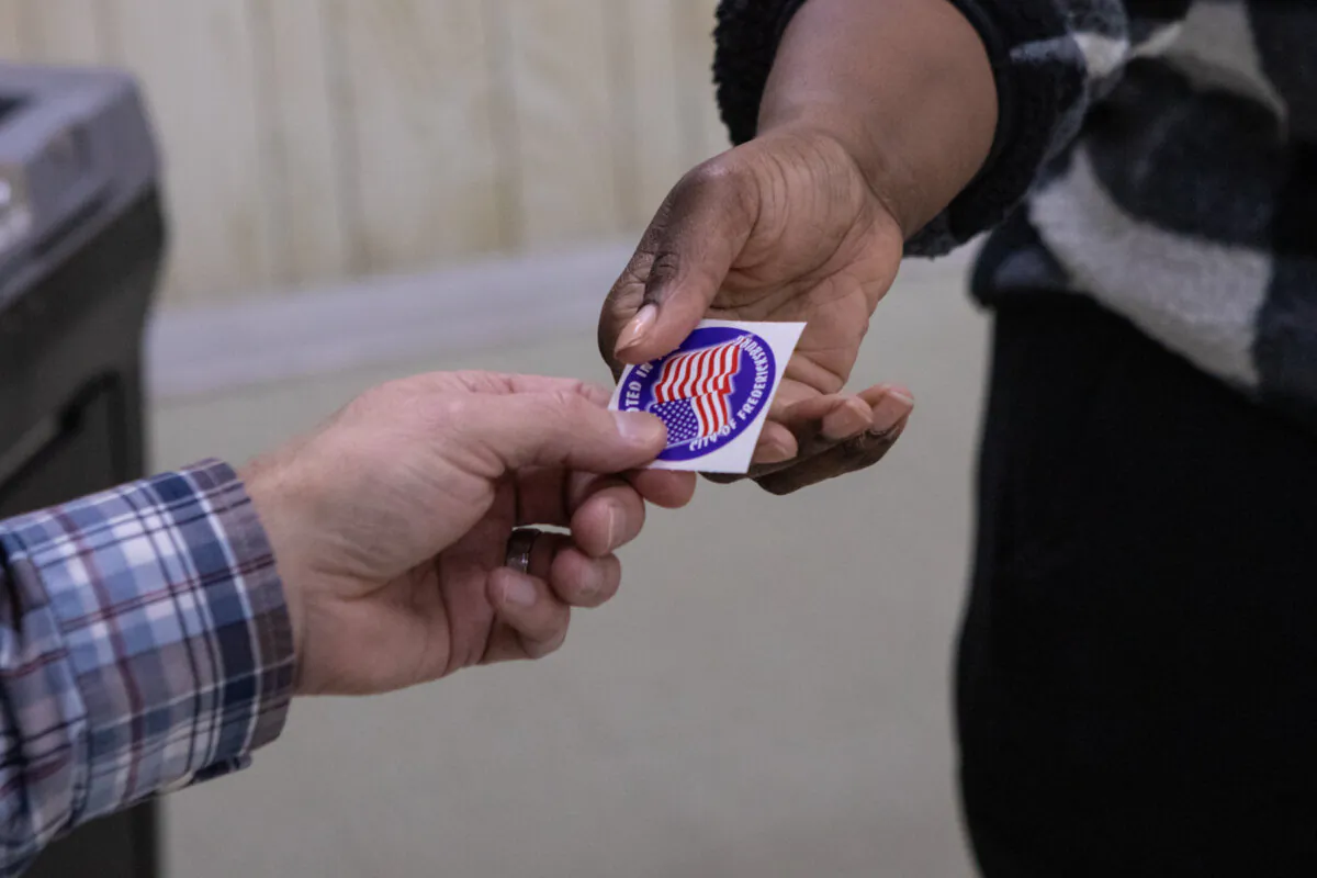 A voter receives a sticker after voting in Fredericksburg, Va., in a undated file photograph. (Anna Rose Layden/Getty Images)