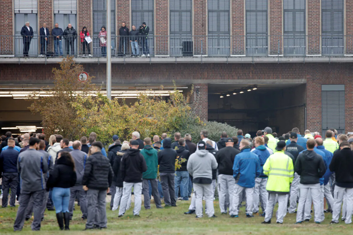 Daniela Cavallo, Chairwoman of the General and Group Works Council of Volkswagen AG, speaks to employees announcing job cuts and closure of a few Volkswagen factories, at the company's headquarters in Wolfsburg, Germany, on Oct. 28, 2024. (Axel Schmidt/Reuters)