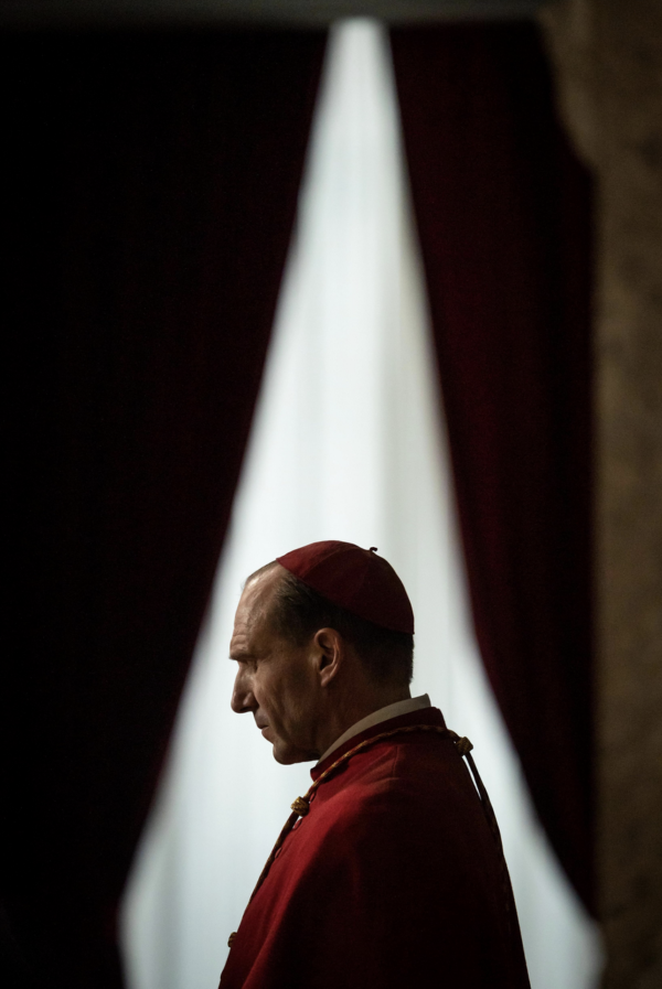 cardinal in front of a window in Conclave