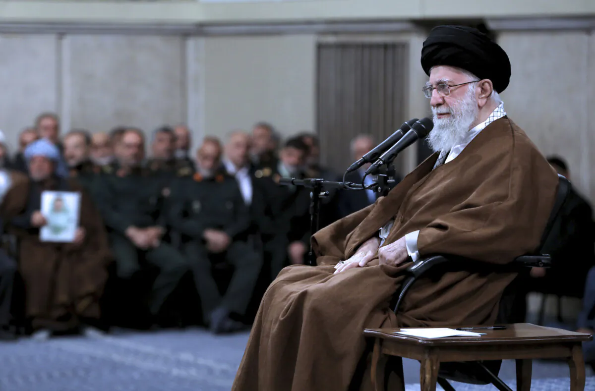 In this photo released by an official website of the office of the Iranian supreme leader, Iranian Supreme Leader Ayatollah Ali Khamenei sits in a meeting in Tehran, Iran, on Oct. 27, 2024. (Office of the Iranian Supreme Leader via AP)