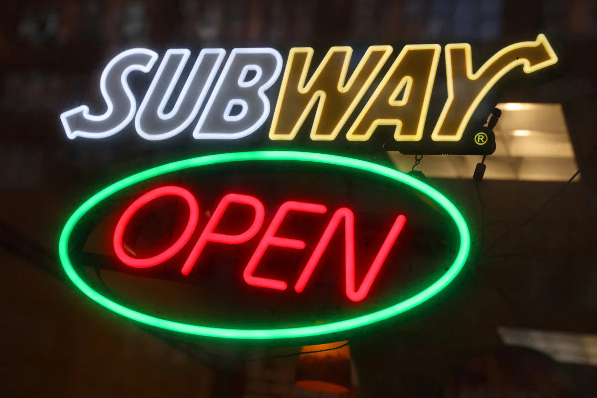 Signage at a Subway restaurant in Manhattan, New York, on Nov. 23, 2021. (Andrew Kelly/Reuters)