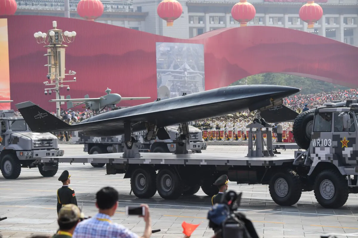 A military vehicle carrying a WZ-8 supersonic reconnaissance drone takes part a military parade at Tiananmen Square in Beijing on Oct. 1, 2019. (Greg Baker/AFP via Getty Images)