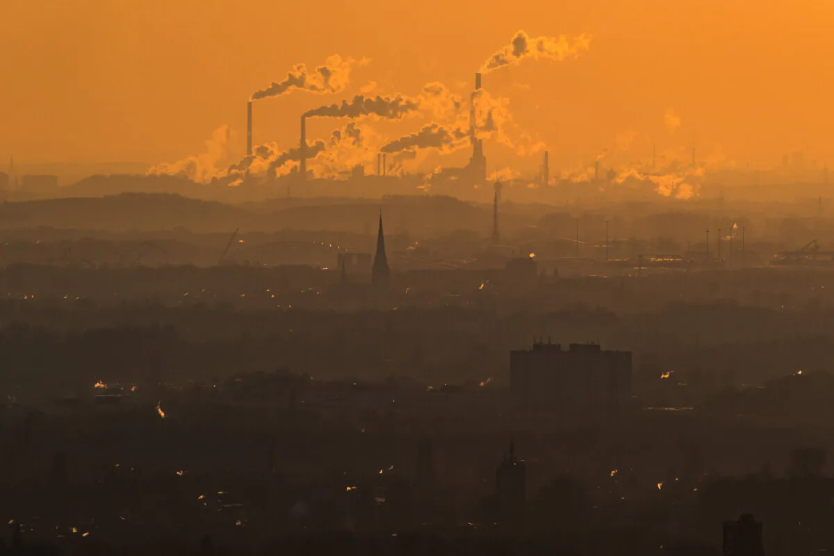 Steam and exhaust rise from different companies on a cold winter day in Oberhausen, Germany, on Jan. 6, 2017. (Lukas Schulze/Getty Images)
