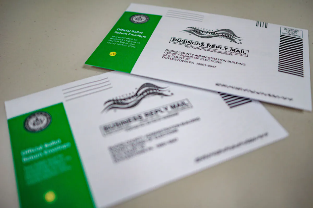 Mail-in ballots are displayed during a processing demonstration at the Board of Elections office in Doylestown, Pa., on Sept. 30, 2024. (Hannah Beier/Getty Images)