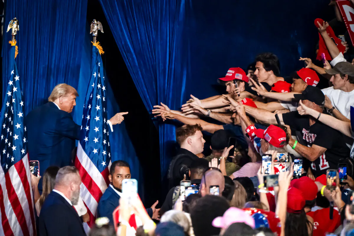 Republican presidential candidate and former President Donald Trump interacts with supporters at a campaign rally at Mullet Arena in Tempe, Ariz., on Oct. 24, 2024. (Rebecca Noble/AFP via Getty Images)