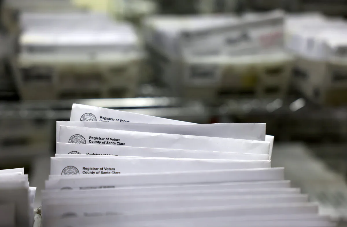 Trays of mail in ballots are stacked at the Santa Clara County registrar of voters office in San Jose, Calif., on Oct. 21, 2024. (Justin Sullivan/Getty Images)