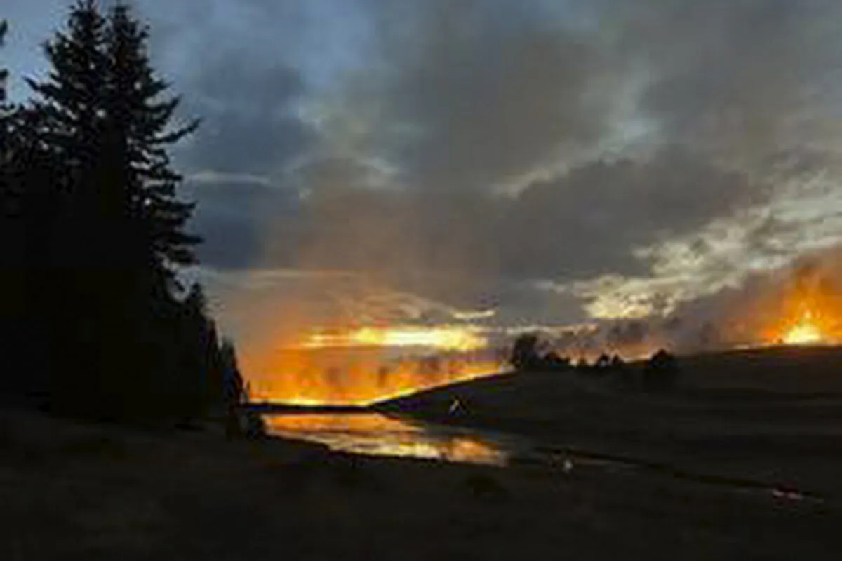 This picture made available by Teller County Sheriff's Office, shows a fire in the Highlands Lake Subdivision northwest of Divide, Colo., Tuesday, Oct. 29, 2024. (Teller County Sheriff's Office via AP)
