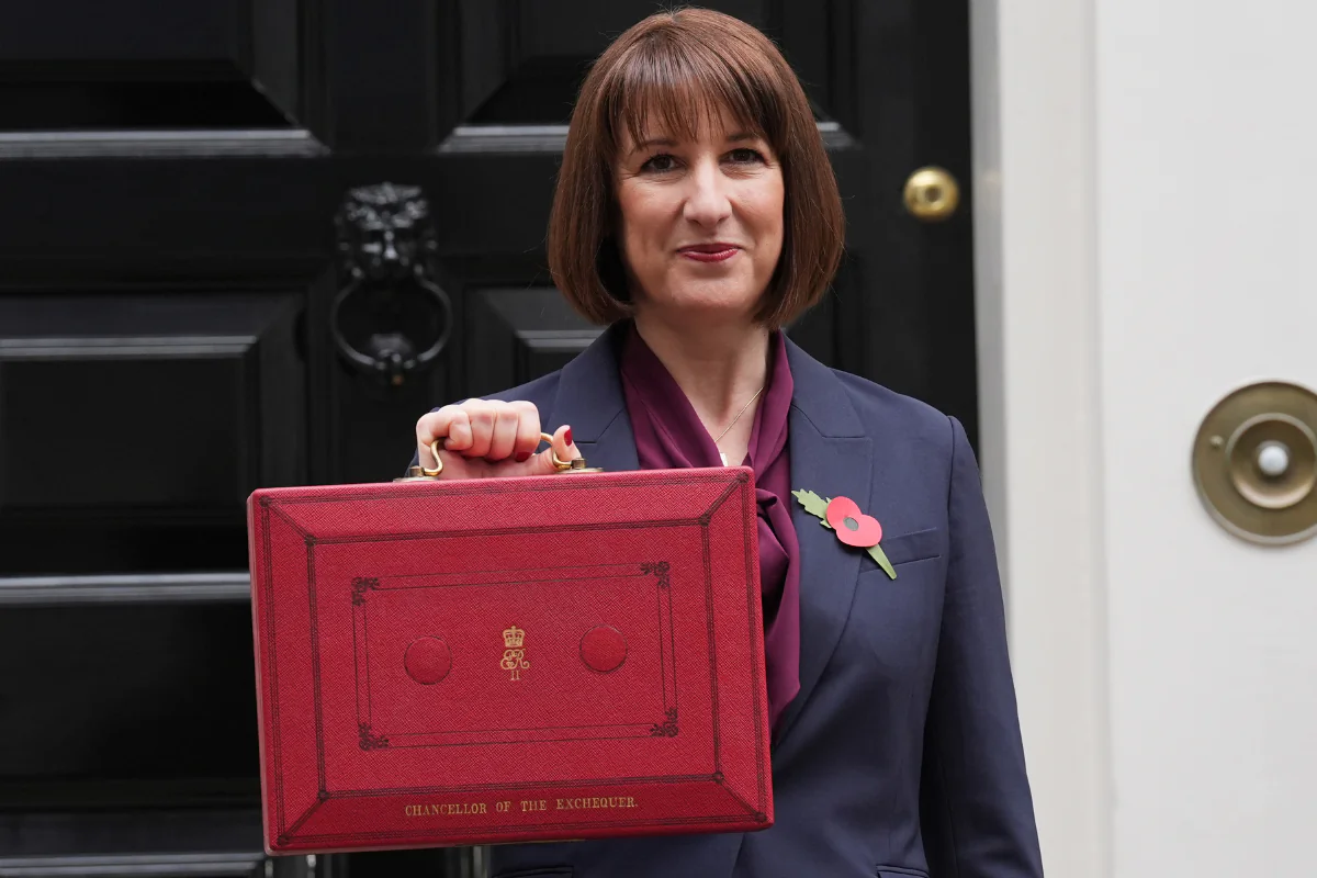 Chancellor of the Exchequer Rachel Reeves poses outside 11 Downing Street with her ministerial red box, before delivering her Budget in the Houses of Parliament in London, England, on Oct. 30, 2024. (Lucy North/PA Wire)