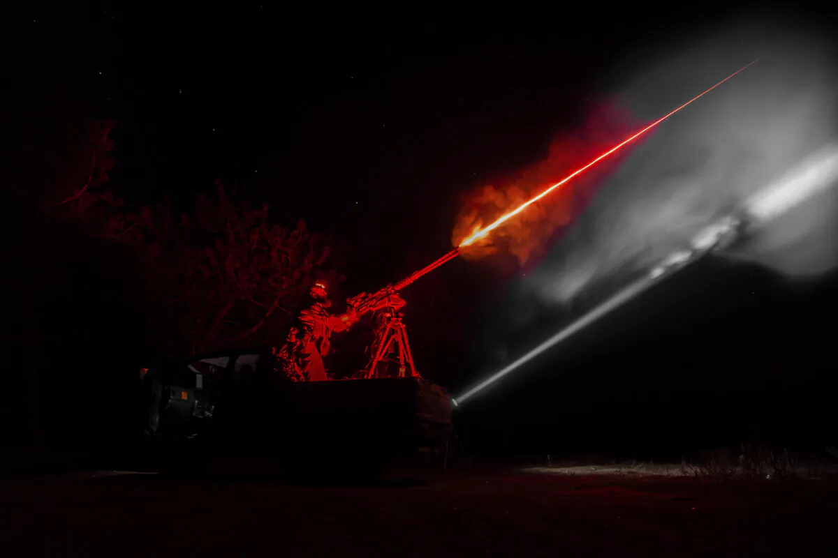 A Ukrainian serviceman of the 126th brigade air-defense unit fires a machine gun during the training in Kherson region, Ukraine, on Oct. 4, 2024. (Marko Ivkov/The Associated Press)