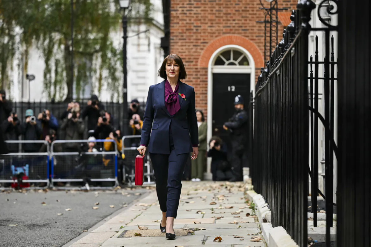 Britain's Chancellor of the Exchequer Rachel Reeves carries the red Budget Box as she leaves 11 Downing Street in London on Oct. 30, 2024. (Justin Tallis - WPA Pool/Getty Images)