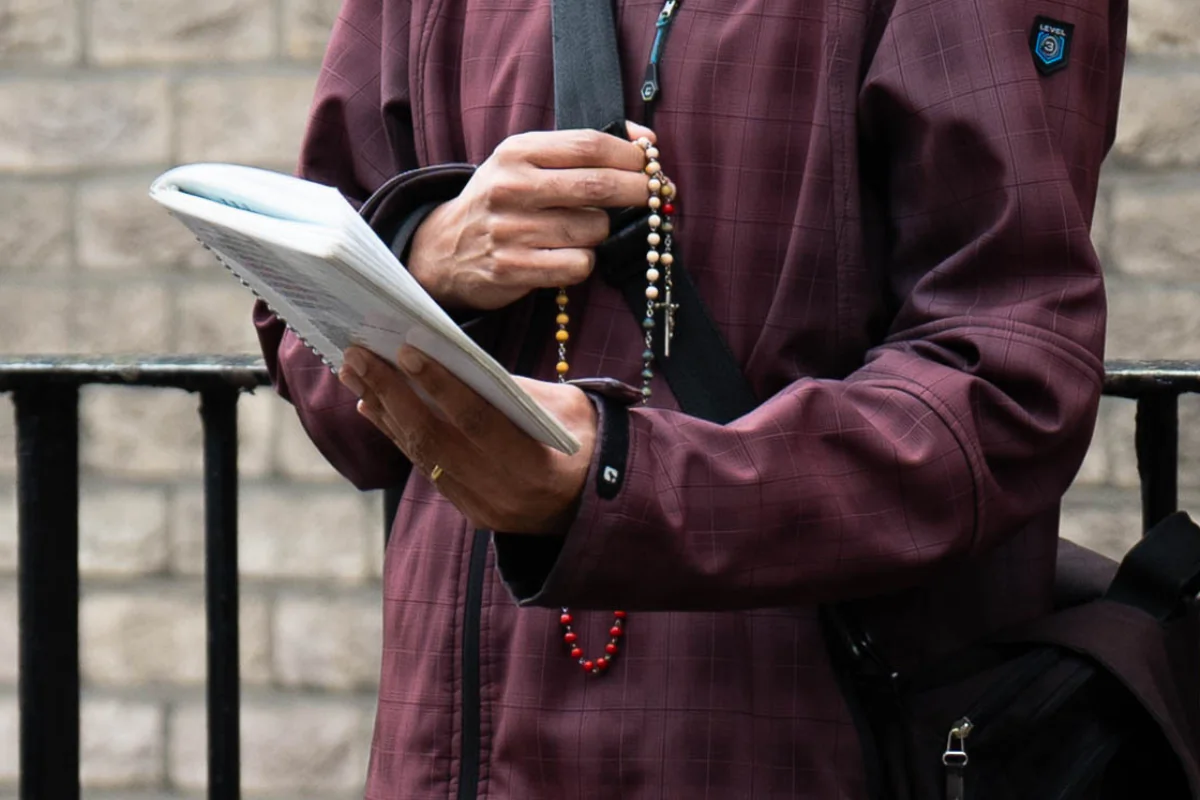 A close up of a prayer book and rosary beads belonging to a pro-life activist outside the MSI Reproductive Choices clinic in London, on Oct. 29, 2024. (James Manning/PA Wire)
