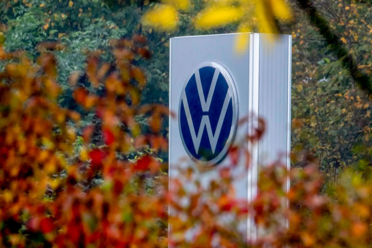 A Volkswagen logo of a car dealer is pictured in Neu-Anspach near Frankfurt, Germany, Wednesday, Oct. 30, 2024. (Michael Probst/AP Photo)