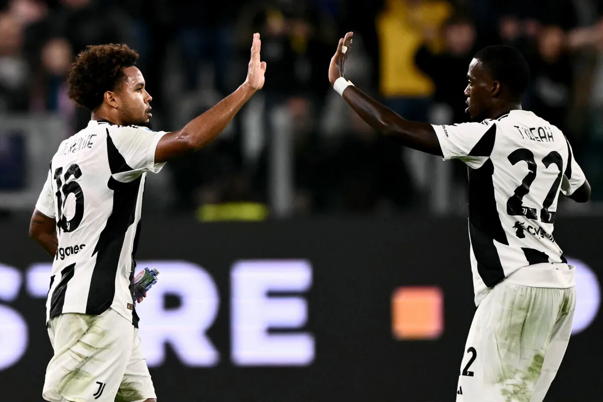 Juventus' American midfielder #16 Weston McKennie celebrates scoring his team's first goal with Juventus' American forward #22 Tim Weah (R) during the Italian Serie A football match between Juventus and Parma, at the Allianz Stadium, in Turin, Italy, on Oct. 30, 2024. (Marco Bertorello/AFP via Getty Images)