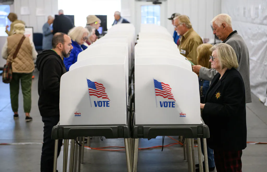 Voters make selections at their voting booths at an early voting site in Hendersonville, North Carolina, on Oct. 17, 2024. (Melissa Sue Gerrits/Getty Images)