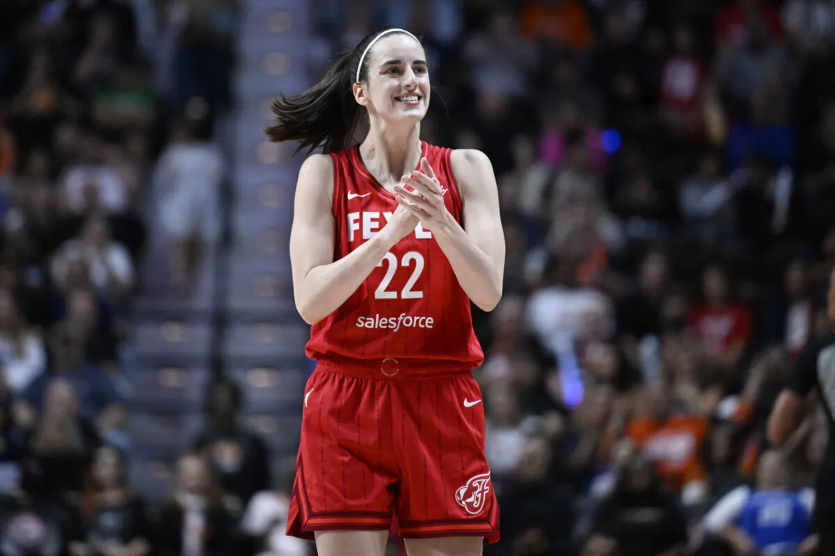 Indiana Fever guard Caitlin Clark (22) reacts during a first-round WNBA basketball playoff game against the Connecticut Sun in Uncasville, Conn., on Sept. 25, 2024. (Jessica Hill/AP Photo)
