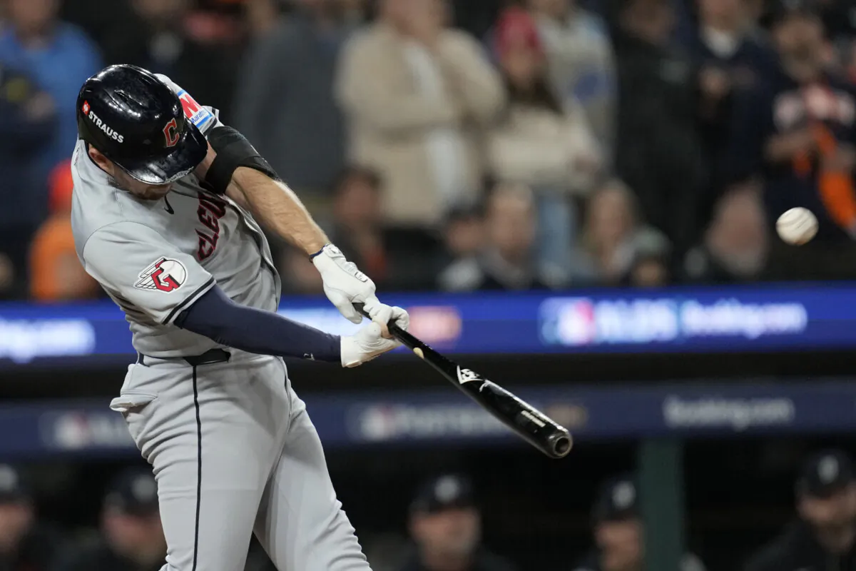 Cleveland Guardians' David Fry hits a two-run home run in the seventh inning during Game 4 of a baseball American League Division Series against the Detroit Tigers in Detroit, on Oct. 10, 2024. (Paul Sancya/AP Photo)