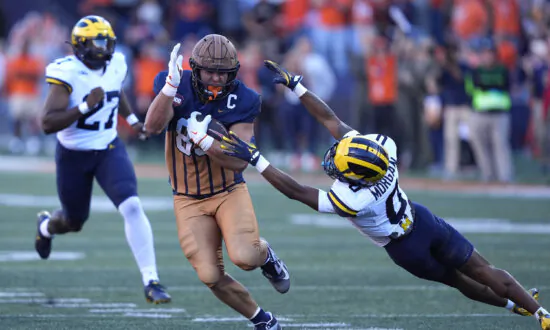 No. 22 Illinois Beats No. 24 Michigan 21–7 for Its First Win Over the Wolverines Since 2009