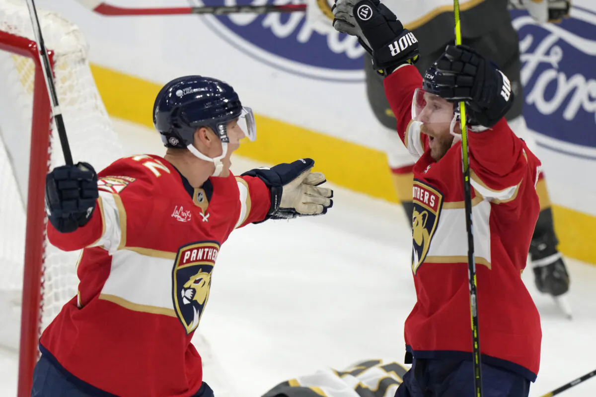 Florida Panthers defenseman Gustav Forsling, left, celebrates with center Sam Bennett after Forsling scored during an overtime period of an NHL hockey game, Saturday, Oct. 19, 2024, in Sunrise, Fla. (Wilfredo Lee/AP Photo)