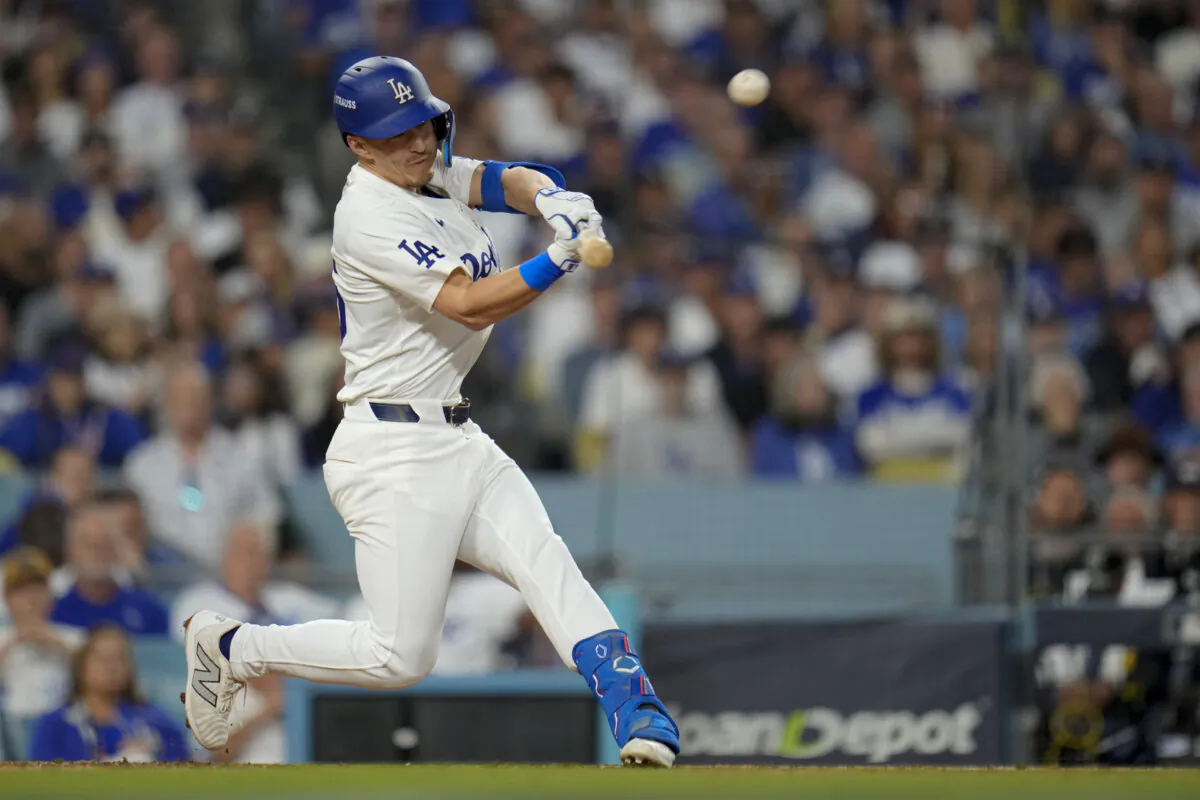 Los Angeles Dodgers' Tommy Edman hits a two-run home run against the New York Mets during the third inning in Game 6 of a baseball NL Championship Series in Los Angeles on Oct. 20, 2024. (Julio Cortez/AP Photo)