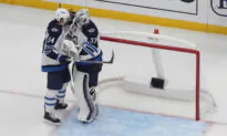 Hellebuyck Stops 27 Shots, Lifts Undefeated Jets to 3-2 Win Over Blues