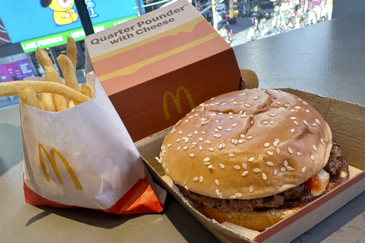 A McDonald's Quarter Pounder hamburger and fries are shown in this photograph, in New York City, on Oct. 23, 2024. (AP Photo/Richard Drew)