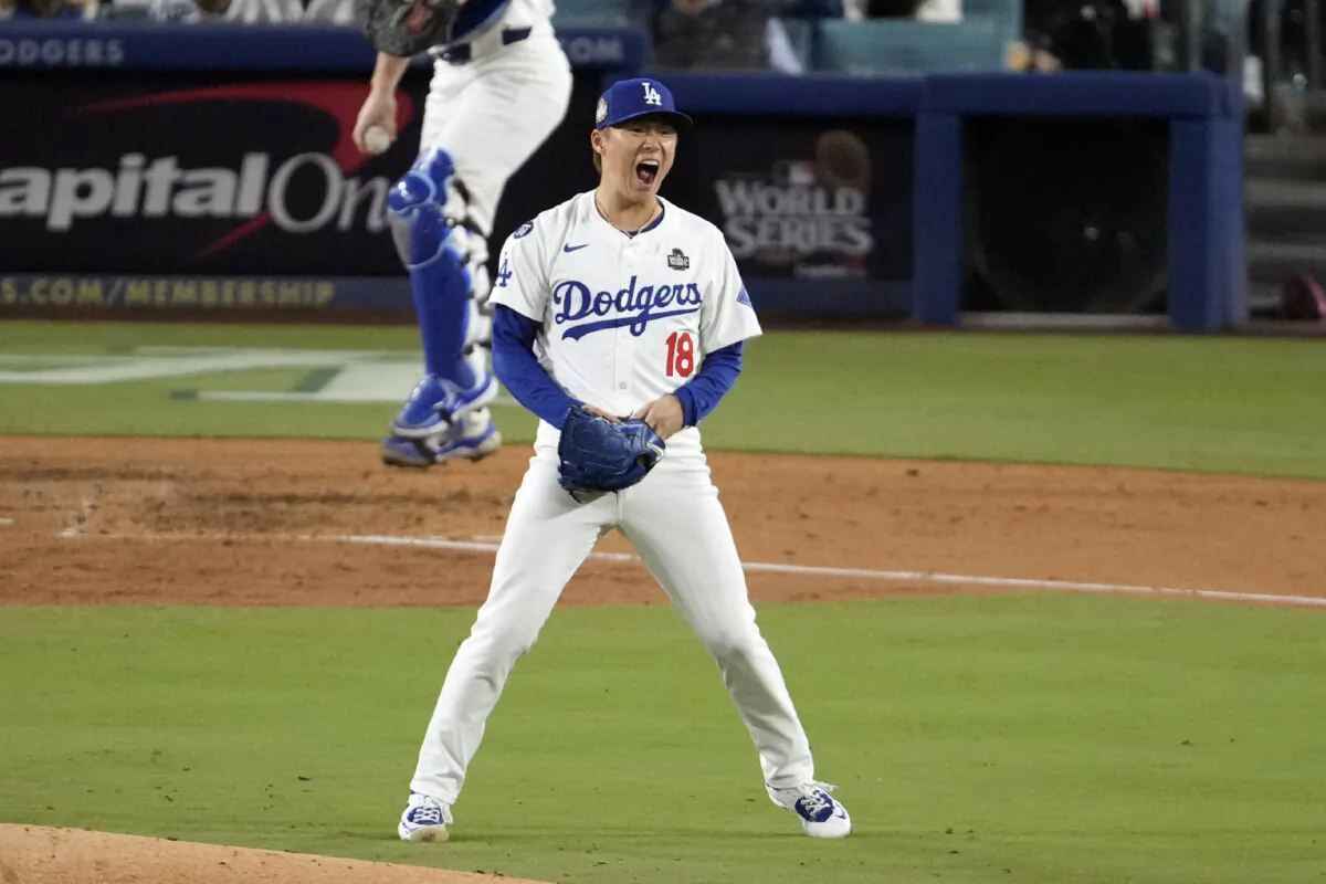 Los Angeles Dodgers starting pitcher Yoshinobu Yamamoto (18) reacts after striking out New York Yankees' Anthony Rizzo during the fourth inning in Game 2 of the baseball World Series in Los Angeles on Oct. 26, 2024. (Julio Cortez/AP Photo)