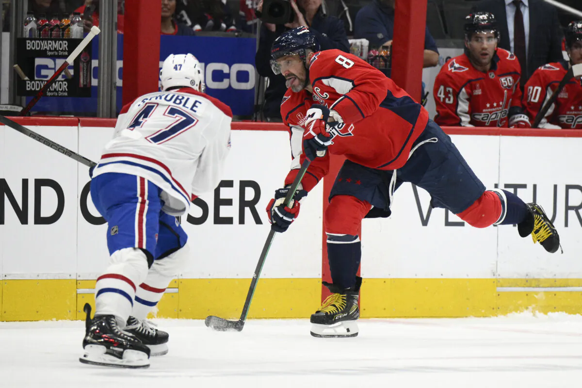 Washington Capitals left wing Alex Ovechkin (8) skates with the puck against Montreal Canadiens defenseman Jayden Struble (47) during the first period of an NHL hockey game in Washington, on Oct. 31, 2024. (Nick Wass/AP Photo)