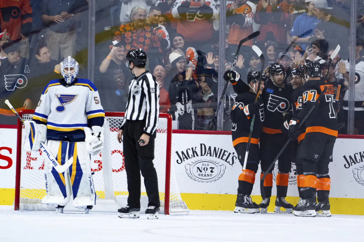 Philadelphia Flyers' Garnet Hathaway, second from right, celebrates his goal with teammates against St Louis Blues' Jordan Binnington, left, during the first period of an NHL hockey game, Thursday, Oct. 31, 2024, in Philadelphia. (Chris Szagola/AP Photo)