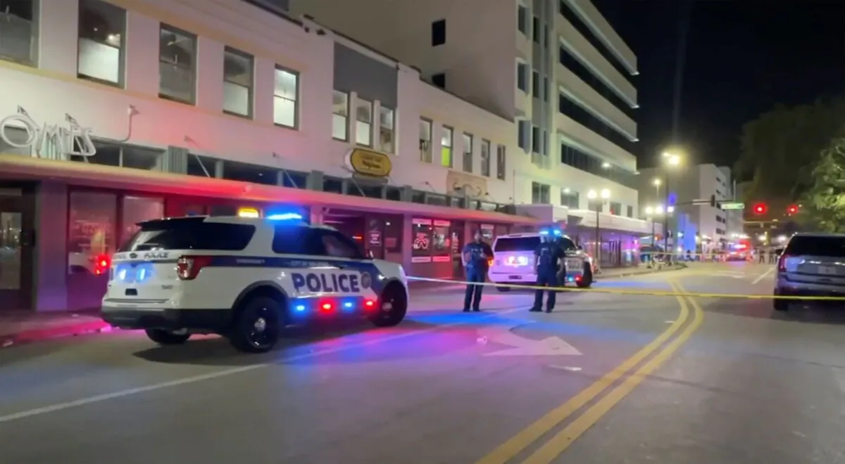 Police investigate the scene of two shootings that took place among crowds during Halloween celebrations in Orlando, on Nov. 1, 2024. (WFTV via AP)