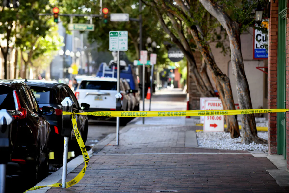 The crime scene tape where a shooting occurred during Halloween festivities in Orlando, Fla., on Nov. 1, 2024. (Gerardo Mora/Getty Images)