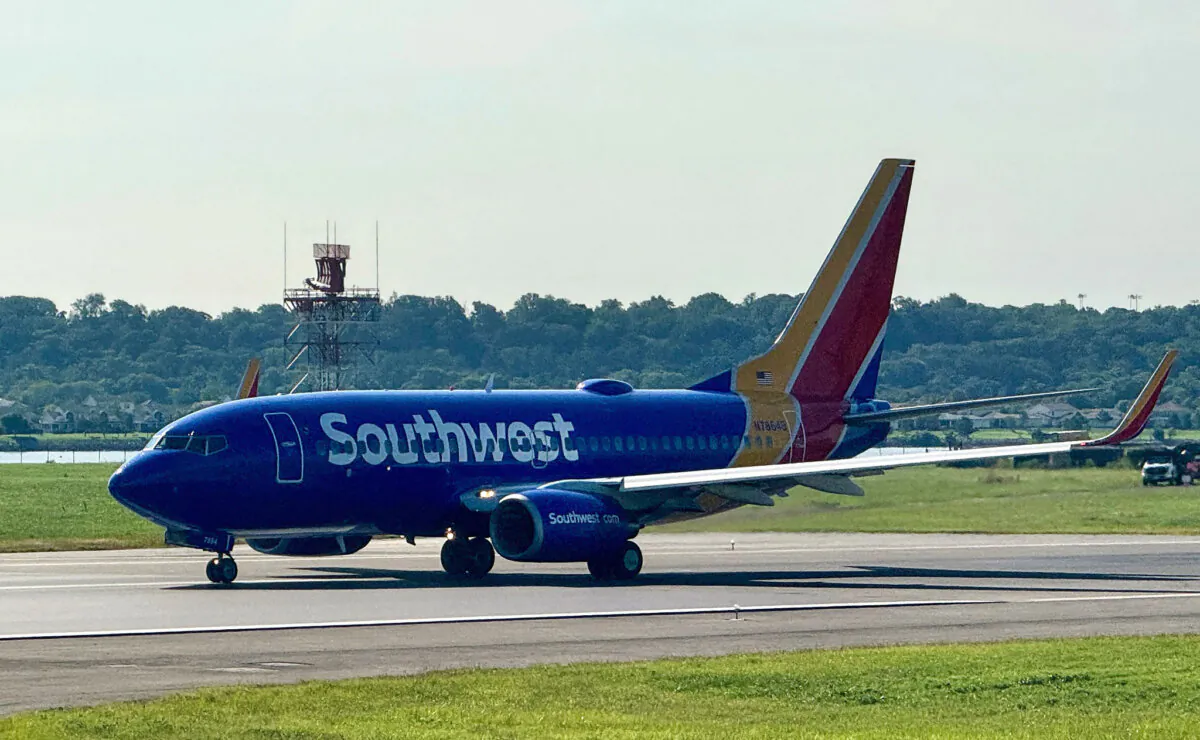 A Southwest Airlines Boeing 737-7Q8 takes off from Ronald Reagan Washington National Airport in Arlington, Va., on Aug. 13, 2024. (Daniel Slim/AFP via Getty Images)