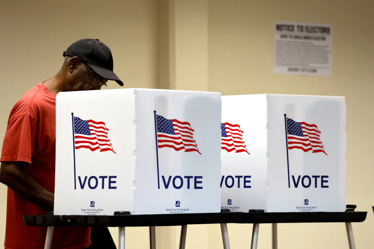 A voter casts an in-person early ballot for the 2024 general election at the Northwest Activities Center in Detroit on Oct. 29, 2024. (Jeff Kowalsky/AFP via Getty Images)