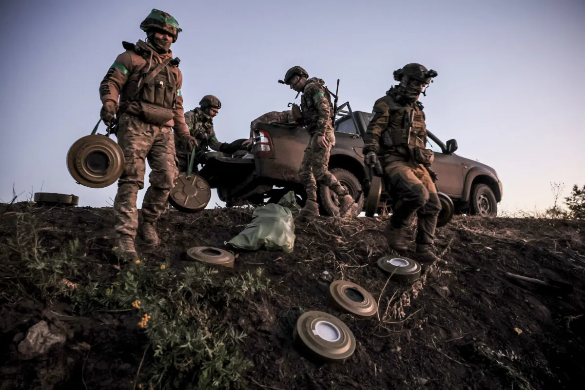 Ukrainian soldiers lay anti-tank mines along the Donetsk frontline on Oct. 30, 2024. (Oleg Petrasiuk/Ukrainian 24th Mechanised Brigade via AP)