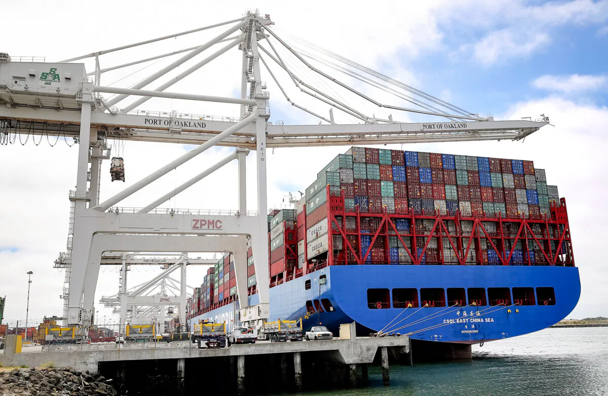 The CSCL East China Sea container ship sits in a berth at the Port of Oakland in Oakland, Calif., on June 20, 2018. A 2023 study estimated that under Section 301 of the Trade Act of 1974, tariffs decreased imports from China by 13 percent each year from 2018 to 2021. (Justin Sullivan/Getty Images)