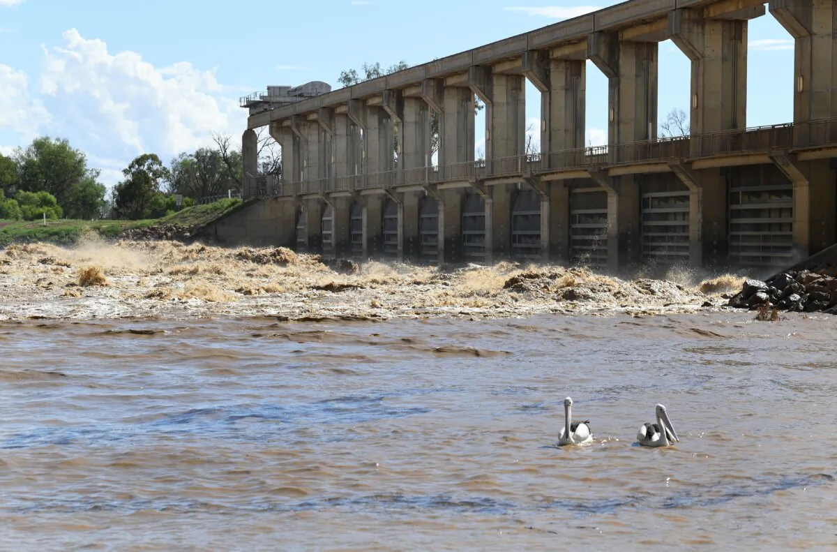 Water being released from the EJ Beardmore dam into the Balonne river near St George, south-western Queensland, Australia on Feb. 26, 2020. (AAP Image/Dan Peled)