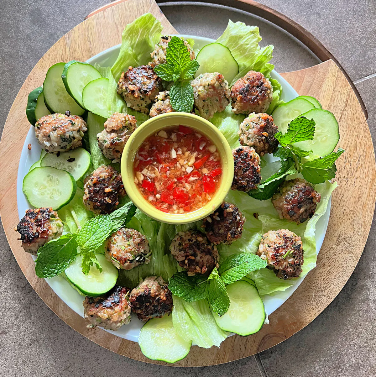 Meatballs with nuoc cham, cucumber, and mint. (Gretchen McKay/Pittsburgh Post-Gazette/TNS)