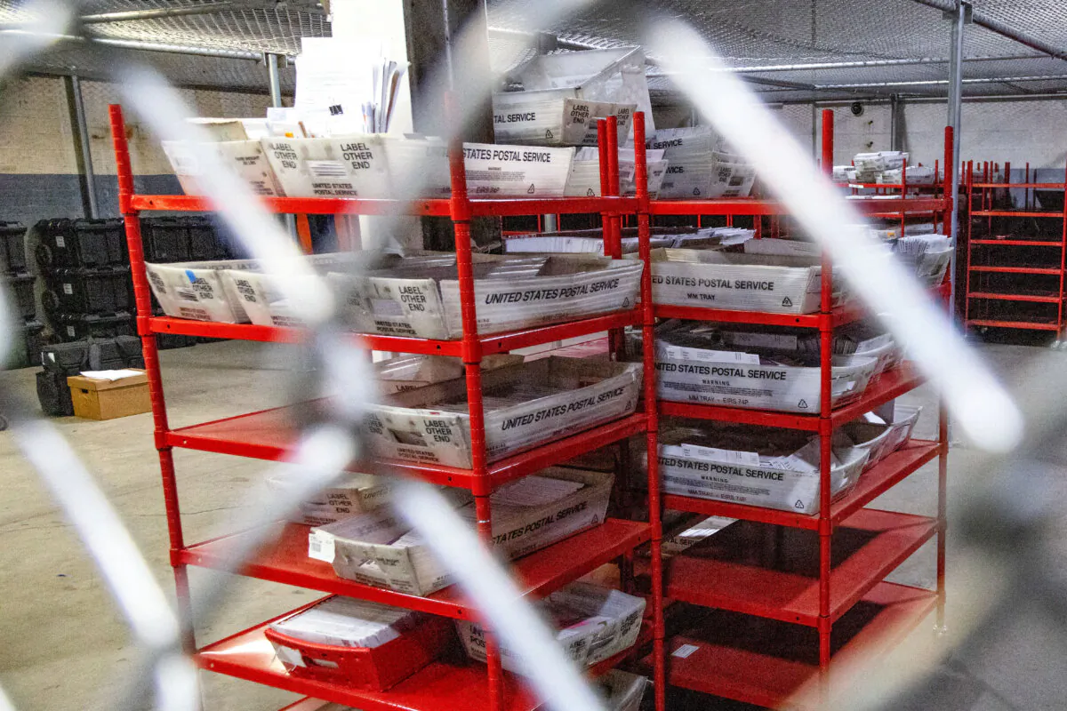 Mail-in ballots are secured inside a cage before Election Day, as officials host a media tour of the Allegheny County election warehouse in Pittsburgh on Oct. 30, 2024. (Rebecca Droke/AFP via Getty Images)
