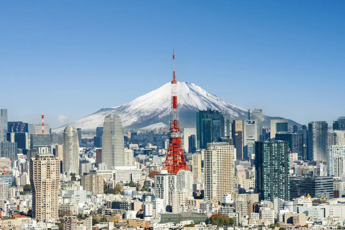 The Tokyo skyline, with Mt. Fuji in the background. (Jackyenjoyphotography/Getty Images)