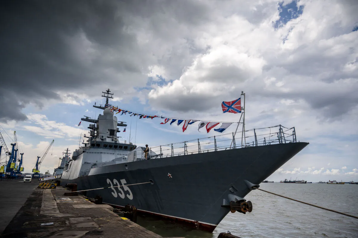 A crew member stands onboard the Russian Navy corvette "Gromkiy" docked at North Jamrud pier of Tanjung Perak port for a 5-day joint military exercise between Indonesia and Russia, in Surabaya on Nov. 4, 2024. (Juni Kriswanto/AFP via Getty Images)