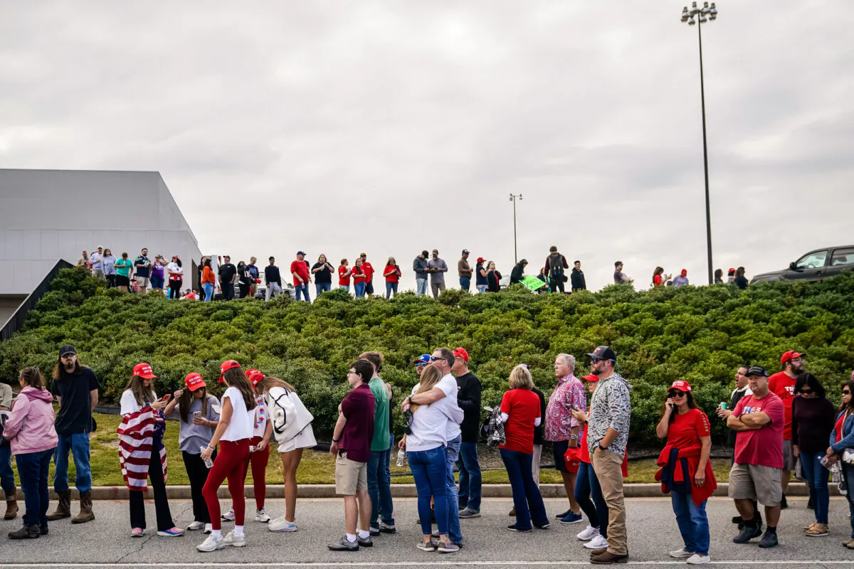 Supporters wait in line to enter a campaign rally for Republican presidential candidate former President Donald Trump in Macon, Ga., on Nov. 3, 2024. (Elijah Nouvelage/AFP via Getty Images)
