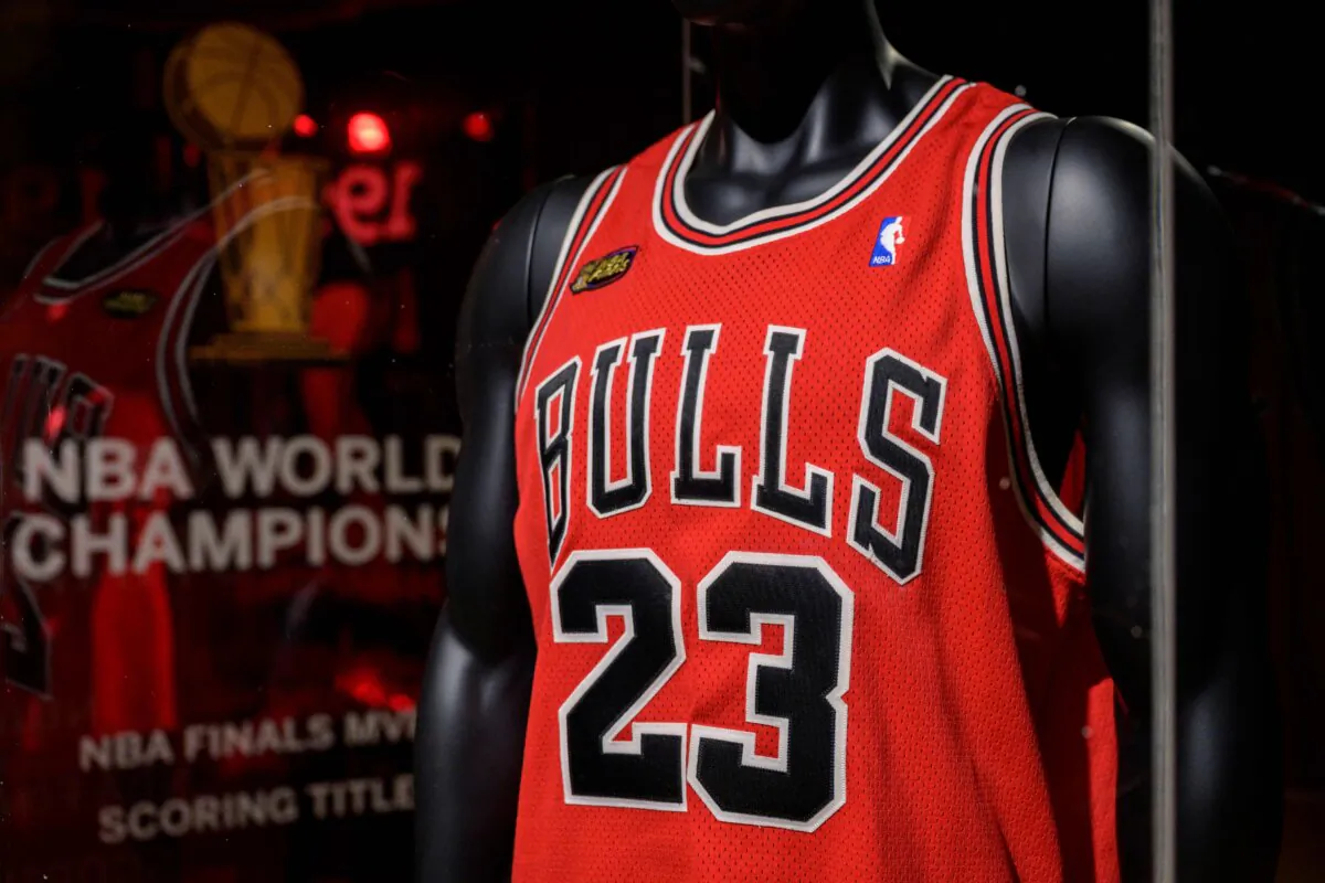 Michael Jordans game-worn 1998 NBA Finals The Last Dance jersey, from game 1, is displayed during Sothebys Invictus sales, in New York City on September 6, 2022. - The iconic red Chicago Bulls jersey, with Jordan's number 23 on the back, is only the second worn by the star during his six championships to be sold at auction. (Angela Weiss/AFP via Getty Images)