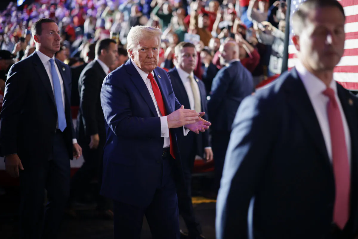 Surrounded by U.S. Secret Service agents, Republican presidential nominee, former President Donald Trump leaves the Santander Arena following a campaign rally in Reading, Pa., on Nov. 4, 2024. (Photo by Chip Somodevilla/Getty Images)